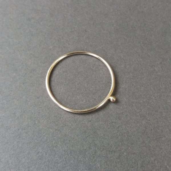 Very thin gold ring with little gold ball detail