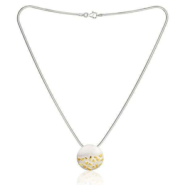 Silver and gold necklace on white background