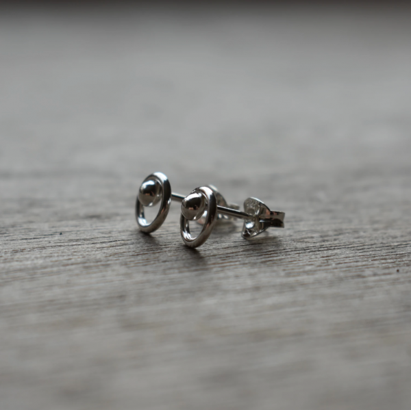 Silver sphere circle studs