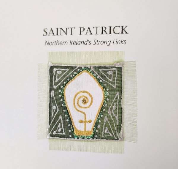 Detail of hand painted silk greeting card featuring St Patrick design