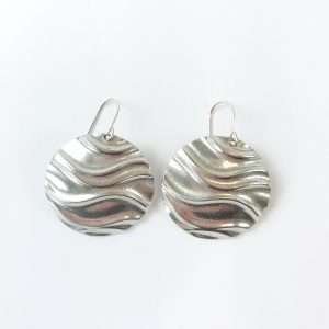 Round pewter earrings with wave texture
