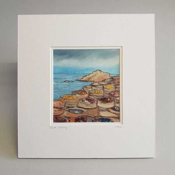 Textile art piece mounted, unframed depicting giant's causeway