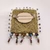 Brooch back fitting