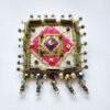 Square embroidered olive coloured brooch
