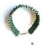 Green embroidered textile bracelet with silver fittings