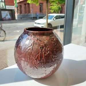 Large brown thrown ceramic earthenware jar