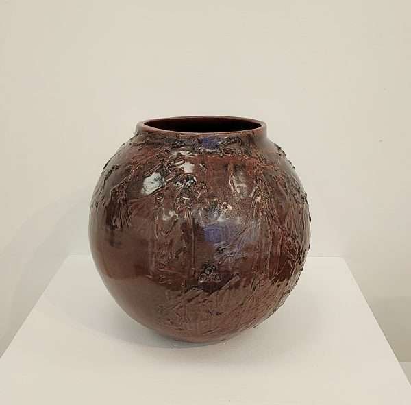 Large brown thrown ceramic earthenware jar