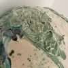 Detail of green glazes on large stoneware jar