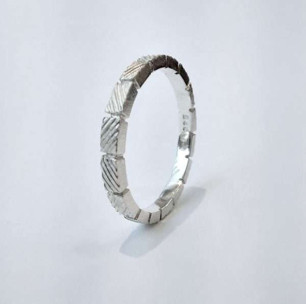 Engraved silver ring band