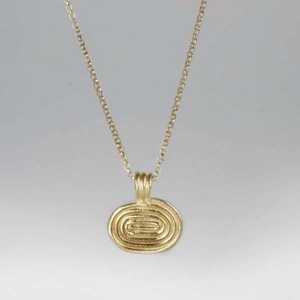 Gold spiral pendant on chain