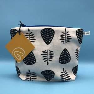 Leaf print zip bag on linen