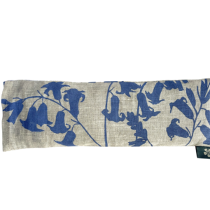 Linen eye pillow printed with a bluebell pattern on natural linen