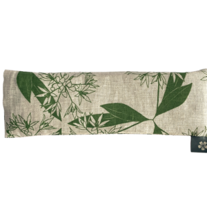 Linen eye pillow printed with a wild garlic pattern in green on natural linen