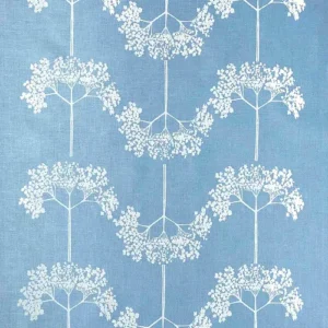Blue linen tea towel printed with an elderflower pattern in white